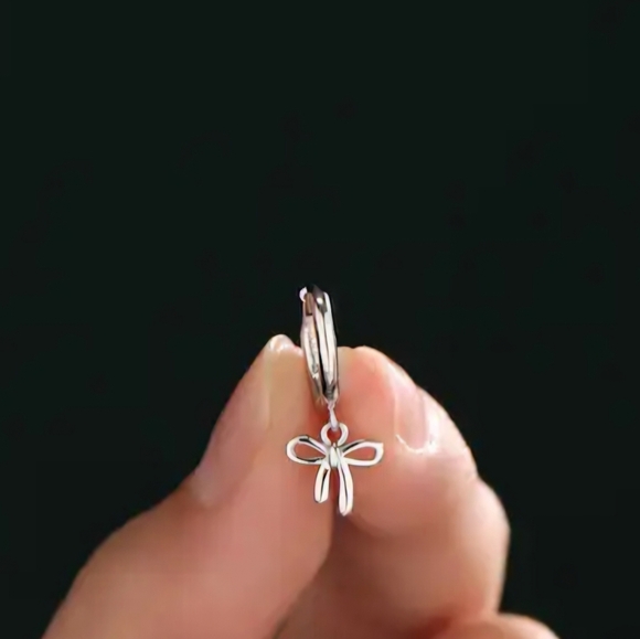 Elegant Sterling Silver Bow Earrings - Picture 2 of 4